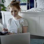 Young woman during e-learning at home
