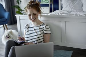 Young woman during e-learning at home